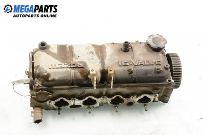 Engine head for Mazda 323 (BA) 1.3 16V, 73 hp, sedan, 5 doors, 1995