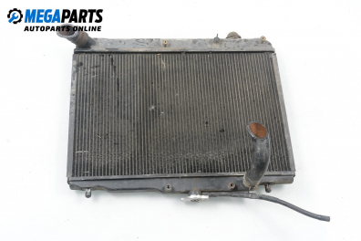 Water radiator for Mazda 121 (DB) 1.1, 54 hp, sedan, 5 doors, 1993