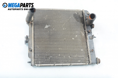 Water radiator for Mitsubishi Lancer 1.5, 84 hp, sedan, 5 doors, 1990