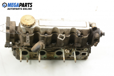 Engine head for Opel Astra F 1.6 Si, 100 hp, station wagon, 5 doors, 1993