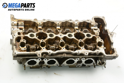 Cylinder head no camshaft included for Nissan Primera (P10) 2.0, 116 hp, station wagon, 5 doors, 1995