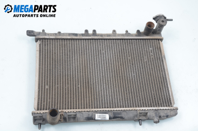 Water radiator for Nissan Almera (N15) 1.4, 87 hp, hatchback, 3 doors, 1997