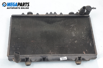 Wasserradiator for Nissan Primera (P10) 1.6, 90 hp, sedan, 5 türen, 1994