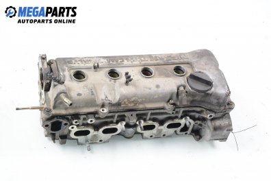 Engine head for Nissan Primera (P10) 1.6, 90 hp, sedan, 5 doors, 1994