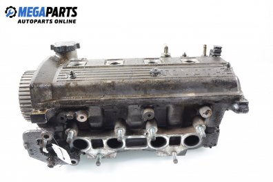 Engine head for Toyota Corolla (E110) 1.3, 86 hp, hatchback, 3 doors, 1997