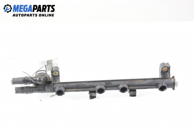 Fuel rail for Volkswagen Passat (B4) 1.6, 101 hp, sedan, 5 doors, 1995