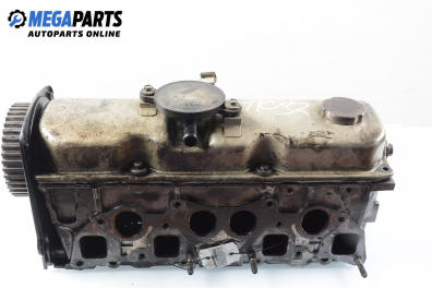 Engine head for Nissan Primera (P10) 2.0 D, 75 hp, sedan, 5 doors, 1996