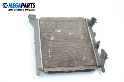 Water radiator for Renault Rapid 1.4, 58 hp, truck, 3 doors, 1991