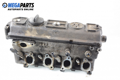 Engine head for Volkswagen Golf II 1.3, 55 hp, hatchback, 3 doors, 1986