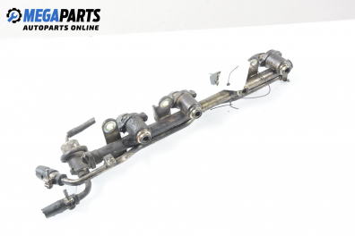 Fuel rail with injectors for Nissan Micra (K11) 1.3 16V, 75 hp, hatchback, 3 doors, 1995