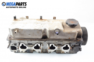 Engine head for Mitsubishi Lancer 1.3 12V, 75 hp, sedan, 5 doors, 1996