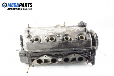 Engine head for Honda Civic VII 1.6, 110 hp, hatchback, 3 doors, 2002