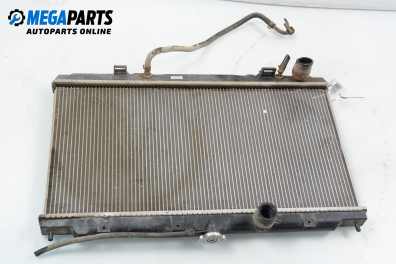 Wasserradiator for Nissan Primera (P12) 2.0, 140 hp, sedan automatic, 2002