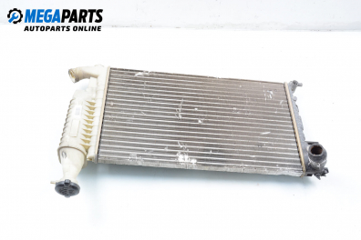 Water radiator for Peugeot Partner 1.8, 90 hp, minivan, 1998