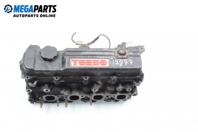 Engine head for Mazda 323 (BA) 1.6 TD, 82 hp, sedan, 1996