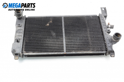 Water radiator for Ford Fiesta III 1.4, 71 hp, hatchback, 1989