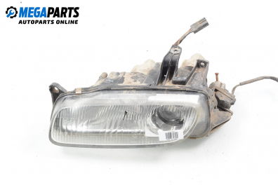 Headlight for Mazda 323 (BA) 1.5 16V, 88 hp, hatchback, 1997, position: left