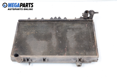 Water radiator for Nissan Primera (P10) (06.1990 - 06.1996) 1.6, 90 hp