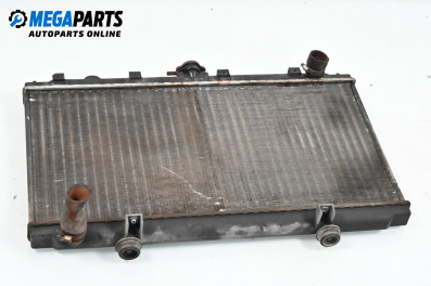 Water radiator for Nissan Primera Sedan II (06.1996 - 12.2001) 1.6 16V, 99 hp