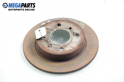 Disc de frână for Nissan Almera (N16) 1.5, 90 hp, hatchback, 5 uși, 2000, position: din spate