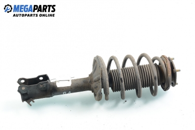 Macpherson shock absorber for Nissan Almera (N16) 1.5, 90 hp, hatchback, 5 doors, 2000, position: front - left