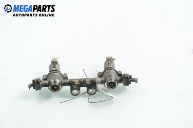 Fuel rail with injectors for Subaru Legacy 2.5 4WD, 150 hp, station wagon automatic, 1997, position: left