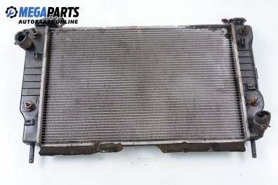 Water radiator for Ford Mondeo Mk II 2.0, 131 hp, hatchback automatic, 1999