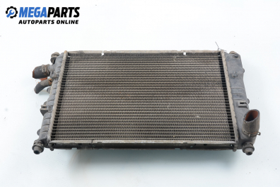 Water radiator for Ford Escort 1.6 16V, 90 hp, station wagon, 1998