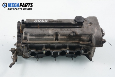 Engine head for Mazda 323 (BA) 1.5 16V, 88 hp, hatchback, 5 doors, 1996