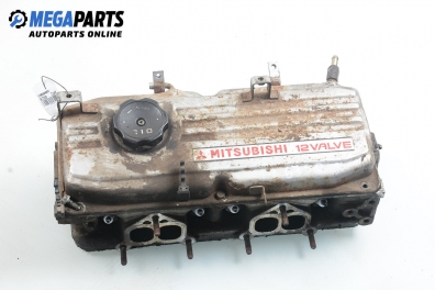 Engine head for Mitsubishi Colt IV 1.3 12V, 75 hp, hatchback, 3 doors, 1995