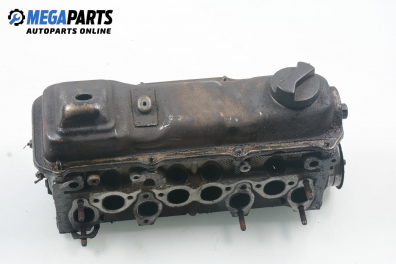 Engine head for Volkswagen Passat (B3) 1.8, 112 hp, sedan, 1990