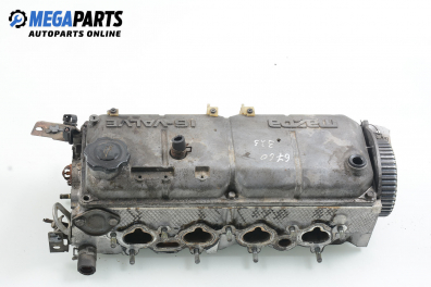 Engine head for Mazda 323 (BA) 1.3 16V, 73 hp, hatchback, 3 doors, 1998