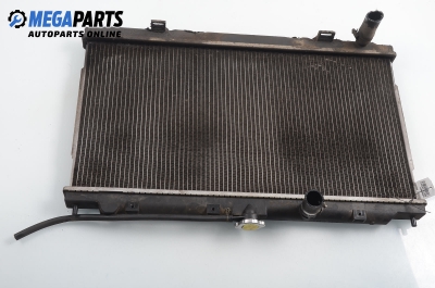 Water radiator for Nissan Almera (N16) 1.5, 90 hp, hatchback, 5 doors, 2000