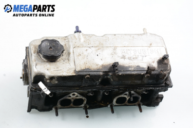 Engine head for Mitsubishi Colt V 1.3, 75 hp, hatchback, 3 doors, 1997