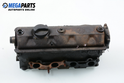 Engine head for Volkswagen Golf II 1.3, 55 hp, 5 doors, 1990