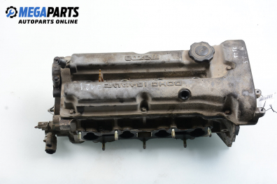 Engine head for Mazda 323 (BA) 1.5 16V, 88 hp, hatchback, 5 doors, 1997