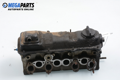 Engine head for Volkswagen Golf II 1.6, 70 hp, 5 doors, 1990