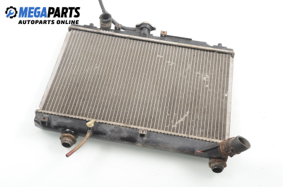 Water radiator for Mazda 121 (DB) 1.3 16V, 53 hp, sedan, 1992