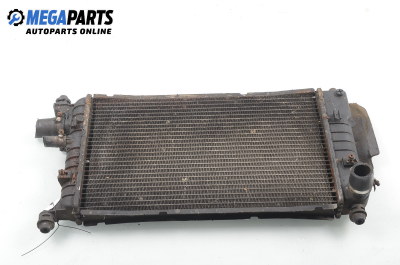 Water radiator for Ford Escort 1.4, 71 hp, hatchback, 5 doors, 1991