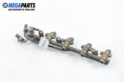 Fuel rail with injectors for Nissan Micra (K11C) 1.3 16V, 75 hp, 3 doors automatic, 1999