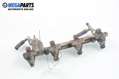 Fuel rail with injectors for Ford Escort 1.8 16V, 115 hp, station wagon, 1997