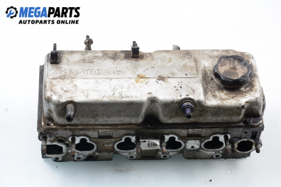 Engine head for Mitsubishi Colt V 1.3, 75 hp, 3 doors, 1999