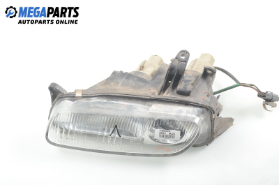 Headlight for Mazda 323 (BA) 1.5 16V, 88 hp, hatchback, 5 doors, 1996, position: left