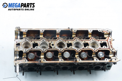 Cylinder head no camshaft included for Volvo 850 2.0, 126 hp, station wagon, 1995