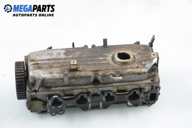 Engine head for Mitsubishi Colt IV 1.3 12V GLI, 75 hp, hatchback, 3 doors, 1995