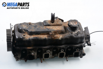 Engine head for Subaru Justy 1.3 4x4, 68 hp, 5 doors, 1997