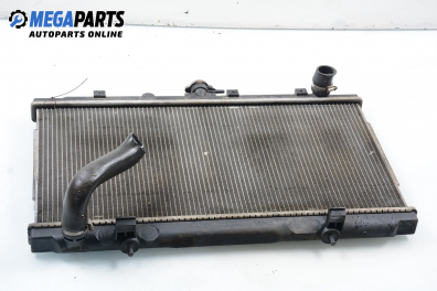 Water radiator for Nissan Almera (N16) 2.2 Di, 110 hp, hatchback, 5 doors, 2001