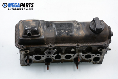 Engine head for Volkswagen Passat (B4) 1.8, 90 hp, sedan, 1994