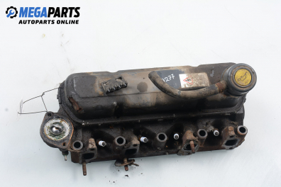 Engine head for Ford Escort 1.3, 60 hp, hatchback, 5 doors, 1994