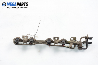 Fuel rail with injectors for Nissan Primera (P10) 1.6, 102 hp, station wagon, 1993